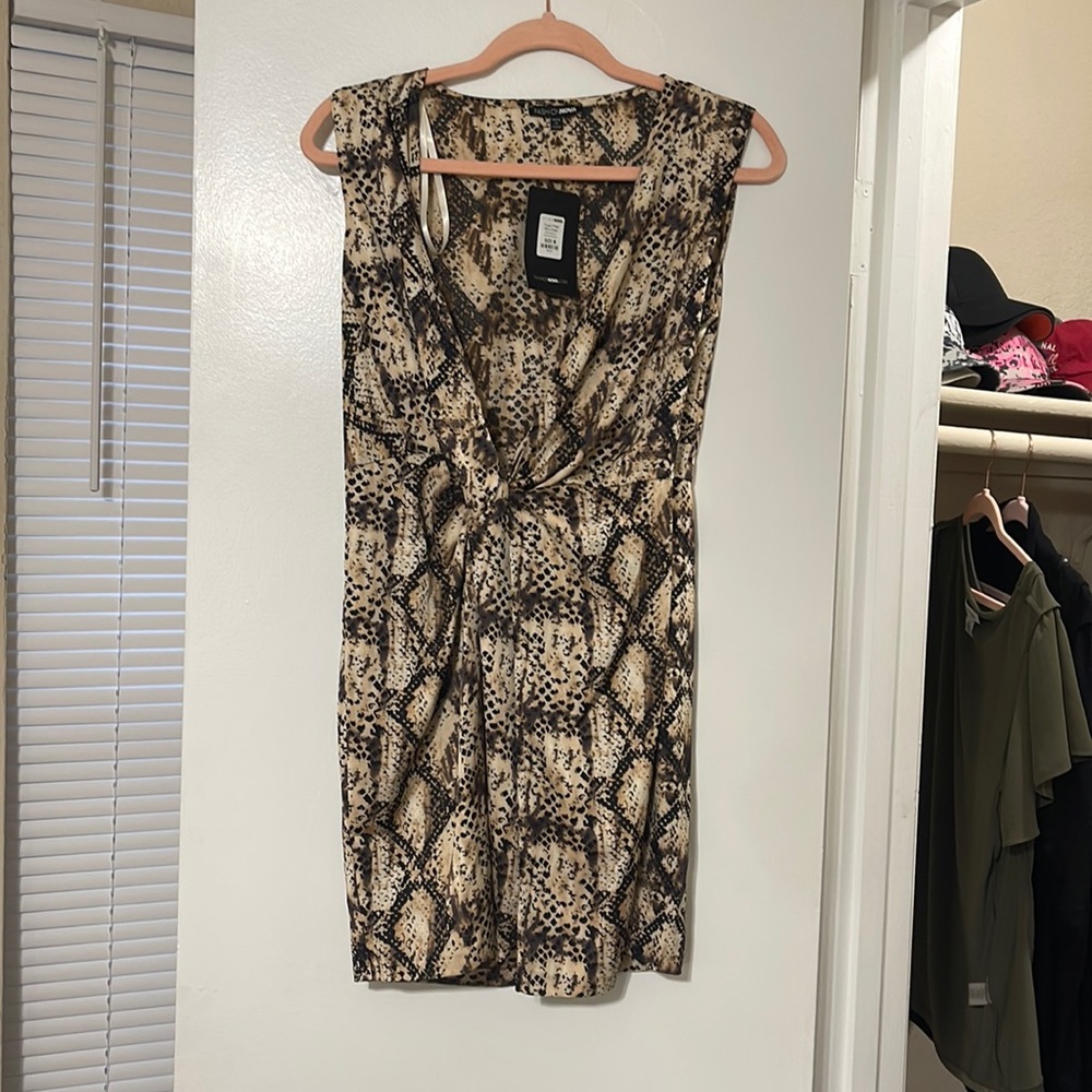 Never worn cheetah dress (has small open slit in front)